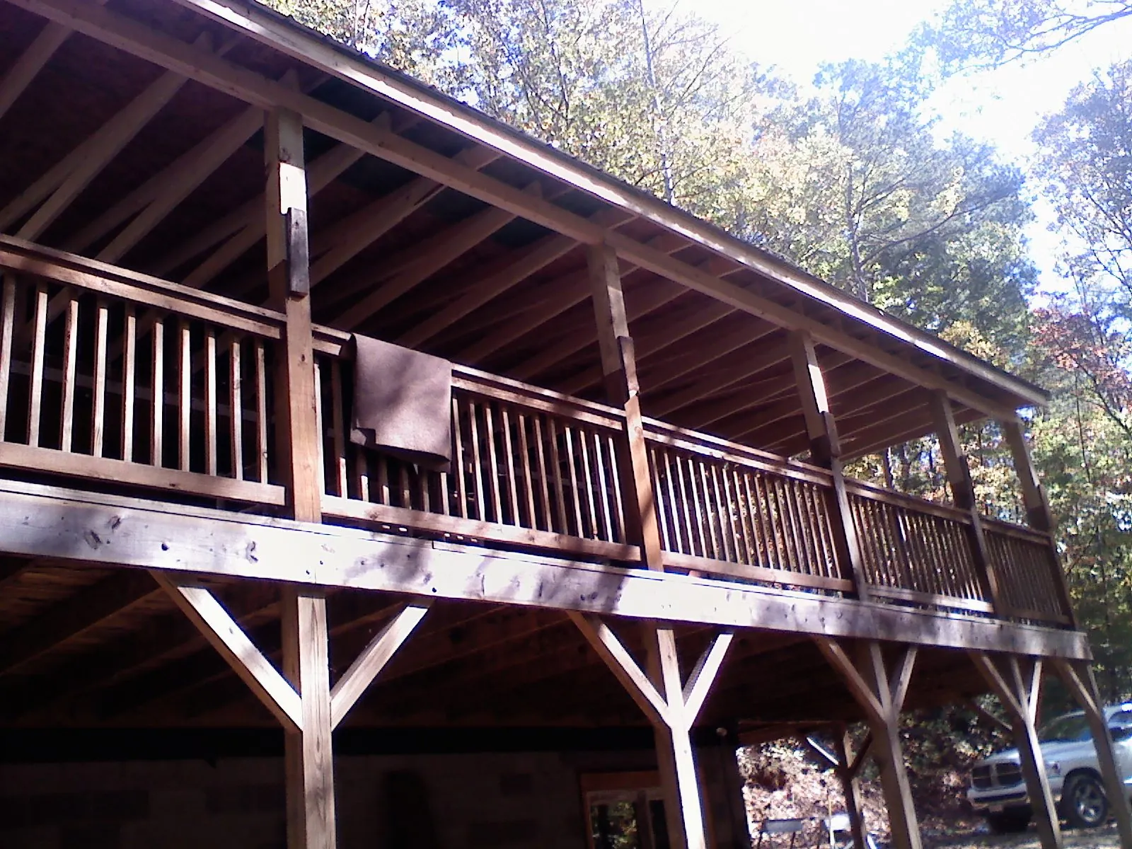 Timber framing under a new elevated porch and deck — Roof Leak Repair in Chichester by Roofing Brothers